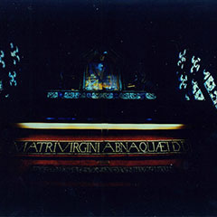 Colour photograph of a wampum belt composed of eleven rows of shell beads. The text Matrivirginiabnaquaeidd is written on it.