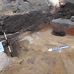 Colour photograph of a pit and a post trace.
